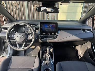 byd e2: Toyota Corolla: 2021 г., 1.8 л, Вариатор, Гибрид, Седан — 8
