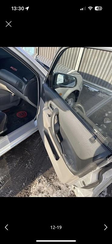 Mazda: Mazda 323: 2004 г., Хэтчбэк — 11