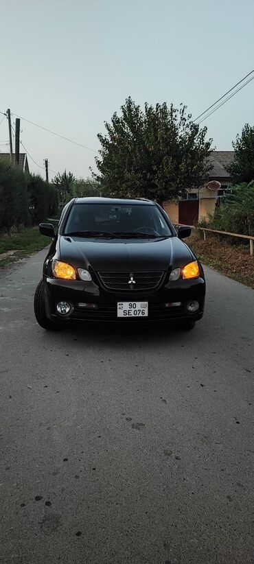 masin pult sistemi: Mitsubishi Airtek: 2.4 l | 2002 il 31000 km Universal