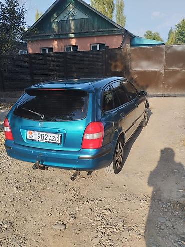 колпак на зил ммз: Mazda Familia: 1999 г., 1.6 л, Механика, Бензин, Универсал — 4