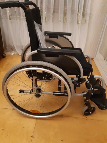 Нитриловые перчатки: Ottobock əlil arabası - Marka/model: Ottobock (şaquli söykənəcəkdə