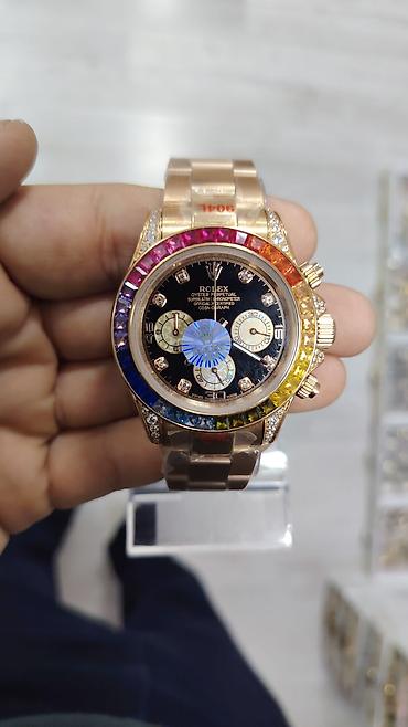 meta eynək: Məhsul: Qızılı tonlu xronoqraf qol saatı (rəngli bezel) Rolex, Rolex — 1