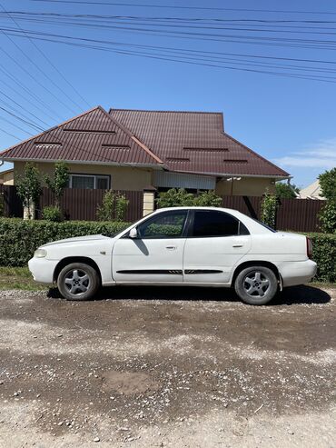 Daewoo: Daewoo Nubira: 1997 г., 1.5 л, Механика, Бензин, Седан