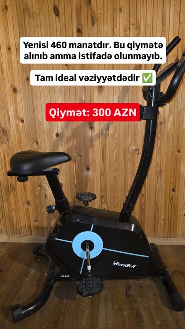 Digər trenajorlar: VolksGym VG-34B stasionar velotrenajor - Rəng: qara, mavi aksentli -