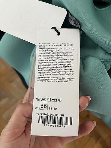 moda piu: PS Fashion ženska haljina – model s upečatljivim volanima - Brend — 3