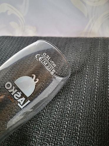 Čaše: Case nove za Lasko pivo. Nove case za pivo sve na njima odsjaj od — 10