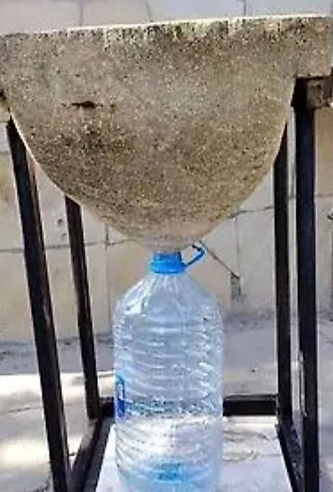 su aparatı: Təbii daşdan hazırlanmış süzmə su qabı (təndir tipli su filtri) 200 il — 2