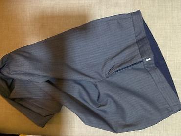 kupaci cacak: Pantalone,velicina 38,dezen riblja kost.Bez ostecenja.Kao nove.Cena — 1