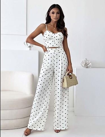 Kompleti: Dvodelni ženski komplet na tufne – top + pantalone širokih nogavicama — 8