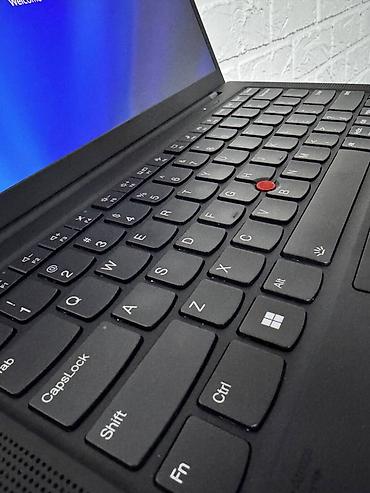 Ноутбуки Lenovo: Lenovo ThinkPad X1 Carbon Gen 9 (i7-1165G7, 4K Дисплей) — это — 11