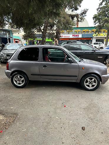 bmw e 38: Nissan Micra (K11) hetçbek, 3 qapı, boz rəng. - Yığcam şəhər — 2