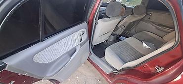 помпа на мазду: Mazda 626: 1999 г., 2 л, Механика, Бензин, Седан — 8