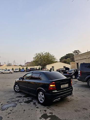 Opel: Model: Opel Astra G sedan Kuzov: 4 qapı, tünd yaşıl rəng Mühərrik və — 13