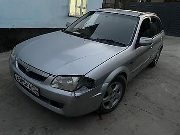 мото зонтик: Mazda Familia: 1999 г., 1.5 л, Автомат, Бензин, Универсал — 4