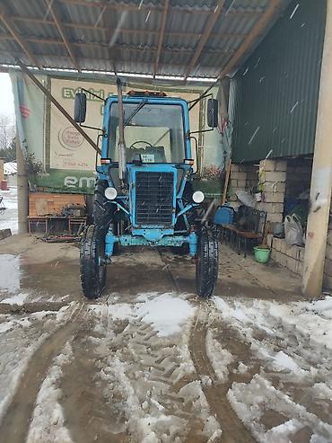 Traktorlar: Mavi rəngli tək kabinalı təkərli traktor.ili 1992 tam zavodu Texniki — 7