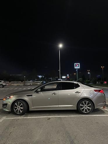 sonata fara: Kia Optima sedan kuzalı avtomobildir. Şəkillərdə avtomobil gümüşü — 4