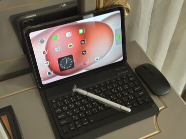 Мониторы: MacPad Air planşeti yeni alinib demek olarki hec istifade olunmuyub