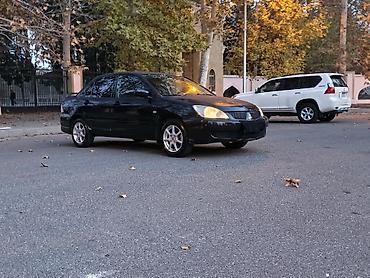 w202 qapı: Mitsubishi Lancer: 1.6 l | 2005 il 290000 km Sedan — 1