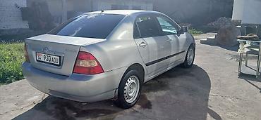 124 е220: Toyota Corolla: 2004 г., 1.6 л, Механика, Бензин, Седан — 3