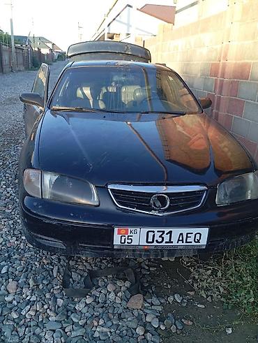 Mazda 626: 1999 г., 2.5 л, Механика, Бензин, Седан