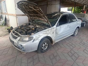 Mazda: Mazda 323: 2002 г., 1.6 л, Механика, Бензин, Седан — 9