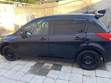 bmw e 39: Nissan Tiida, qara rəng, hetçbek gövdə. - Güclü və qənaətcil benzin — 3