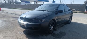 Mitsubishi: Mitsubishi Lancer: 2005 г., 1.6 л, Механика, Бензин, Седан