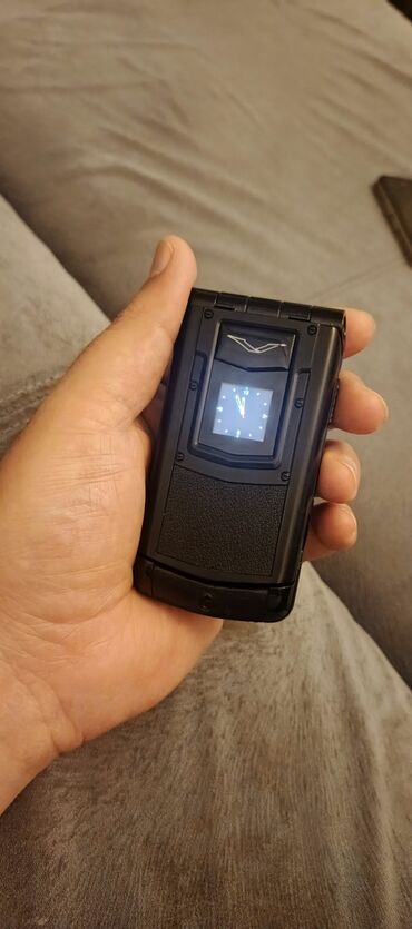 телефон fly сенсорный андроид: Vertu