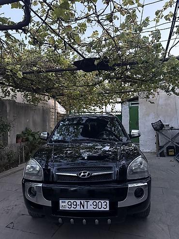 e39 rul: Hyundai Tucson: 2 л | 2009 г. Кроссовер — 1