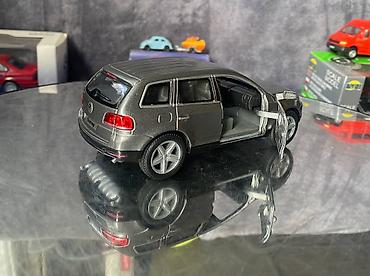 Avtomobil modelləri: Коллекционная модель volkswagen touareg grey metallic 2003 kinsmart — 16