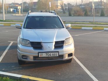 каропка сди: Mitsubishi Outlander: 2003 г., 2.4 л, Автомат, Газ, Внедорожник