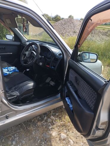 Nissan: Nissan Cube: 1997 г., 1.3 л, Автомат, Бензиновая, Минивэн — 11