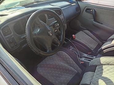 210 миллениум: Nissan Primera: 2001 г., 0.2 л, Механика, Бензин, Универсал — 5