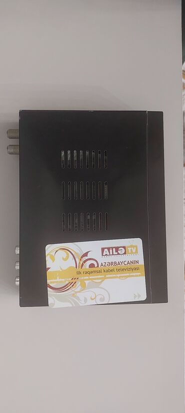 reqemsal tv aparat: Ailətv aparatı kartı,pultu hər şeyi var. satış qiyməti 60 manatdir