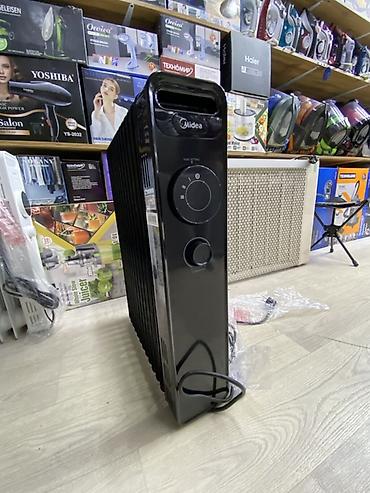 обогреватель мидеа: Масляный радиатор Midea NY2513-22M(B) - Тип: масляный электрический — 2