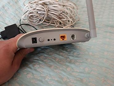tp link c60: TP-Link modem/router satılır. Wi‑Fi paylayıcısı kimi istifadə olunan — 2