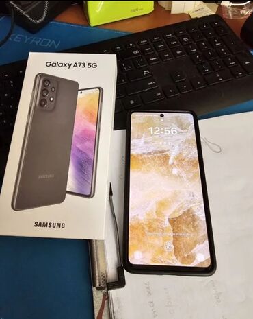 телефон fly nimbus 8: Samsung Galaxy A73 5G, 128 ГБ, цвет - Черный, Сенсорный, Отпечаток пальца, Беспроводная зарядка