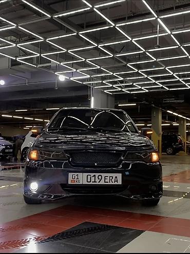 Другие автомобили: Седан черного цвета с доработанным экстерьером. Основные особенности — 4