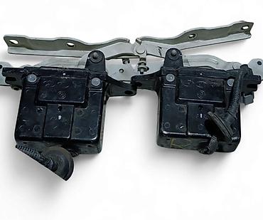 step: Активный привод капота— Kia Carnival • Код запчасти L  — 2