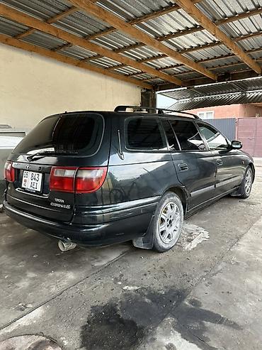 чанган юни с: Toyota Carina E: 1997 г., 1.8 л, Механика, Бензин, Универсал — 4