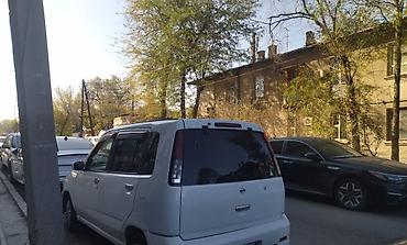 var: Nissan Cube: 2000 г., 1.3 л, Вариатор — 2