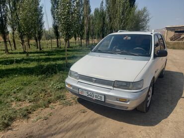 Другие автомобили: Просторный минивэн белого цвета с рейлингами на крыше — 14