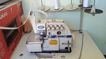 швейный станок: Швейная машина Gemsy, Автомат