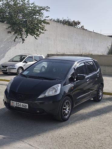 mazda 323 2003: Honda Jazz: 2009 г., 1.4 л, Автомат, Бензин, Хэтчбэк — 2