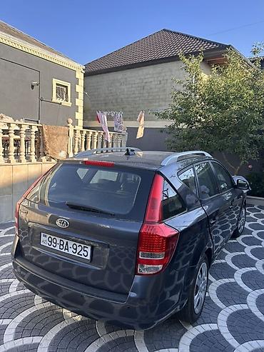 kia optima nece masindi: Kia Cee’d SW (universal), tünd boz rəng. - Gövdə tipi: universal (SW) — 4