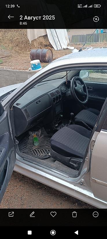 Toyota: Toyota Дуэт: 2002 г., 1.3 л, Механика, Бензин, Хэтчбэк — 8