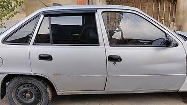 devo tiko: Daewoo Nexia: 2010 г., Механика, Седан — 2