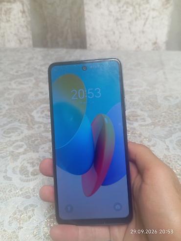 Məhsul: Smartfon - Tam ekranlı, nazik çərçivəli dizayn; ön kamera