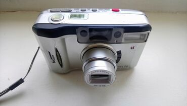 kodak tabletkası qiymeti: Gümüşü rəngli, avtofokus funksiyalı kompakt film kamerası. Bu kamera