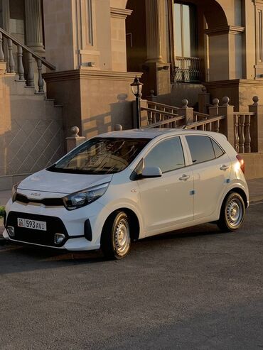 машине арзан: Kia Picanto, белый хэтчбек 5 дв. Основные характеристики: -